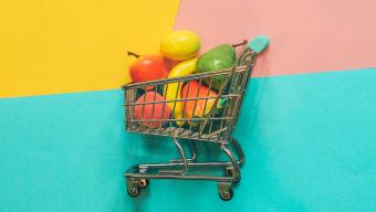 grocery cart filled with fruit