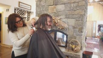 Rachael cutting John's hair
