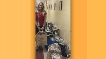 Rebecca with food donations