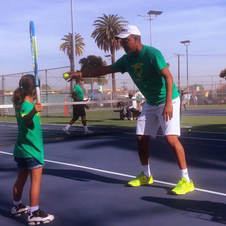Marty Woods teaching tennis