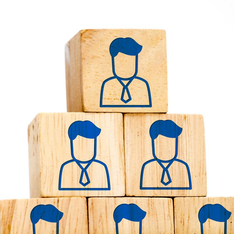 corporate profile icons on wood cubes