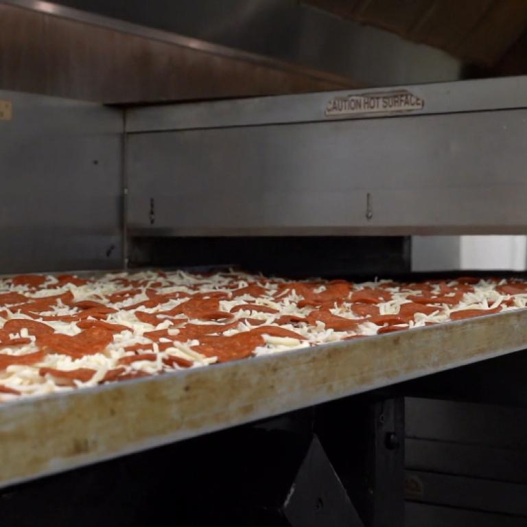 World's Largest Pizza going into the oven
