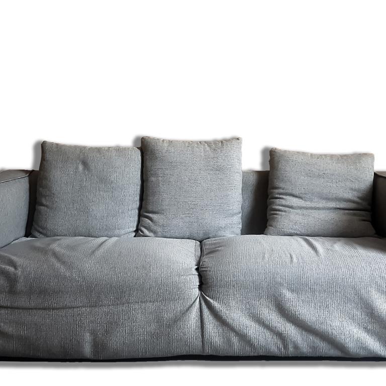 old couch with sagging cushions
