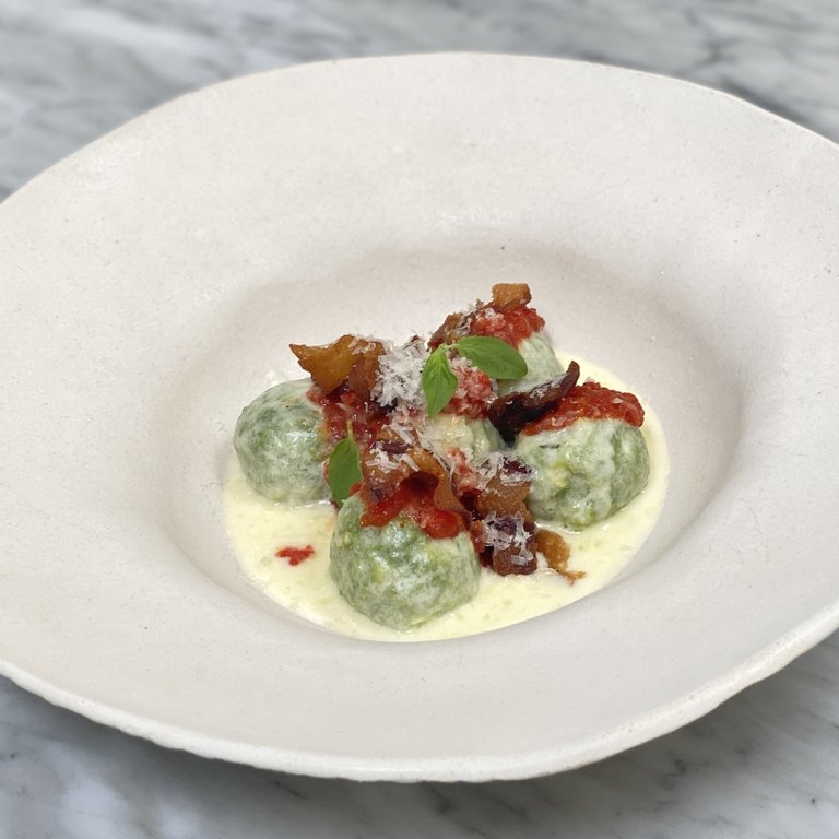 Spinach Ricotta Gnudi with Tomato Sauce and Crispy Guanciale