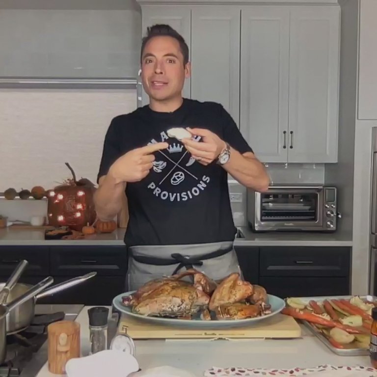 Jeff Mauro busy saving our Thanksgiving dinners. 