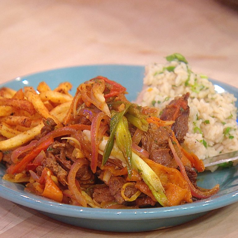 Peruvian-Style Beef Stir-Fry with Rice and Fries