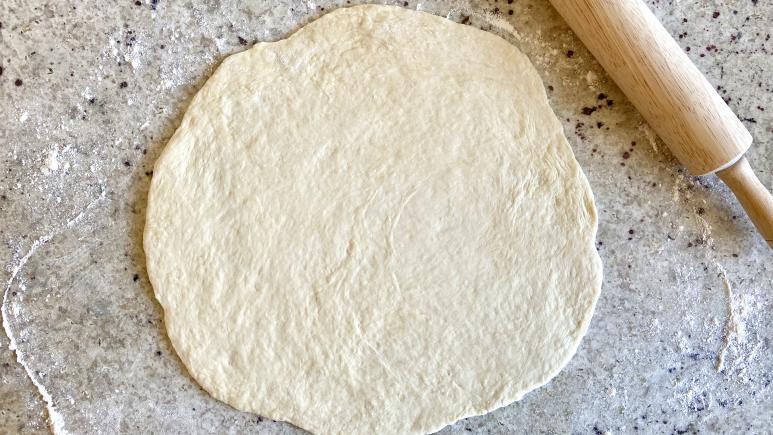 pizza dough rolled