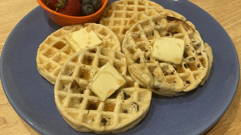 homemade mini waffles with butter and syrup