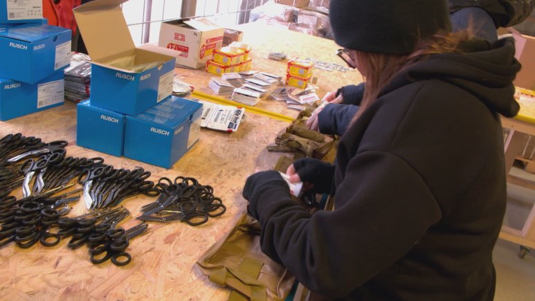 Rachael building trauma kits at a safe house in Ukraine